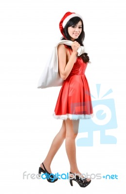 Santa Woman  Holding A White Bag Stock Photo