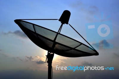 Satellite Dish In Shadow Stock Photo