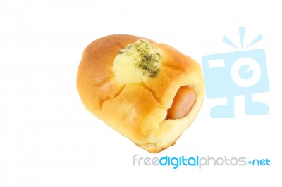 Sausage In Bread And Cheese On White Background Stock Photo