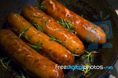 Sausages & Rosemary Stock Photo