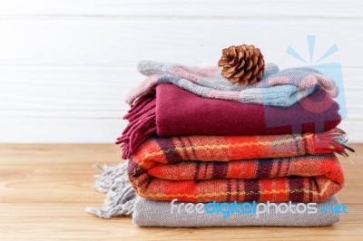 Scarft Gloves And Blanket Background Stock Photo