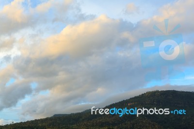 Scenic Of Clouds Over Mountain Stock Photo