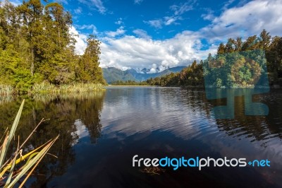 Scenic View Of Lake Matheson Stock Photo