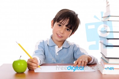 School Boy Doing His Homework Stock Photo