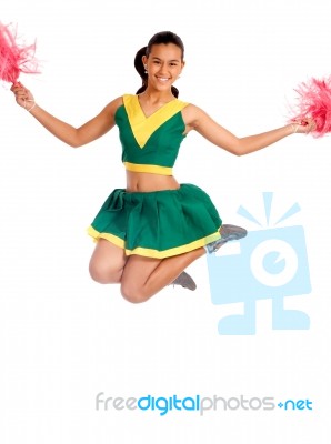 School Cheer Leader Jumping Stock Photo