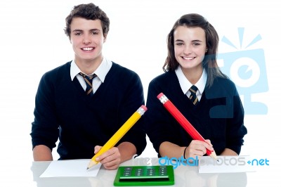 School Friends Writing On Pencil Stock Photo