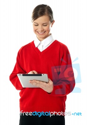 School Girl Using New Touch Pad Device Stock Photo