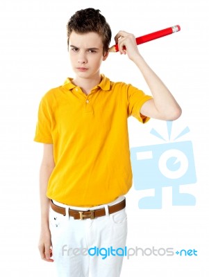 Schoolboy Holding Pencil Stock Photo