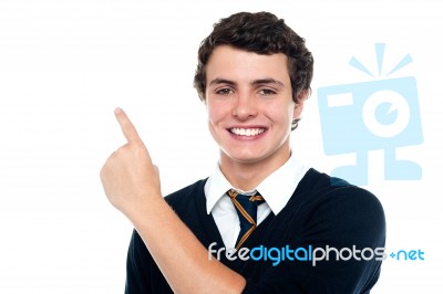 Schoolboy Showing Pointing Up Stock Photo