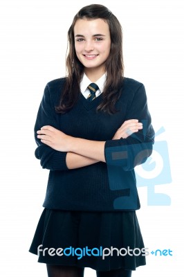 Schoolgirl With Crossed Arms Stock Photo