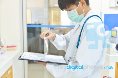 Scientist With Equipment And Science Experiments Stock Photo