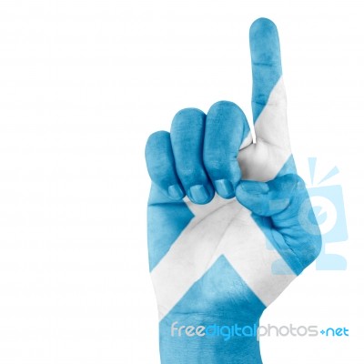 Scotland Flag On Pointing Up Hand Stock Photo