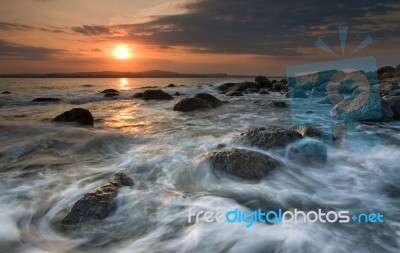 Sea Embraces Stock Photo