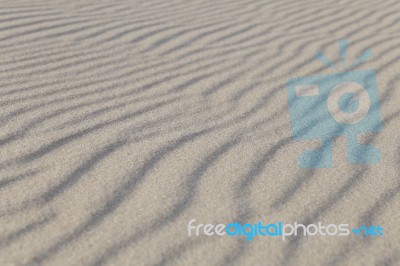 Sea Sand At Sunset Light Stock Photo