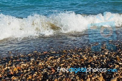 Sea Shore With Round Stones Stock Photo