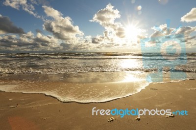 Sea Sunset On The Beach Stock Photo