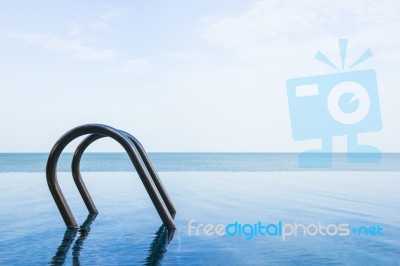 Sea View Of Infinity Swimming Pool With Sky Stock Photo