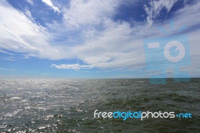 Sea Water Under A Blue Sky Stock Photo