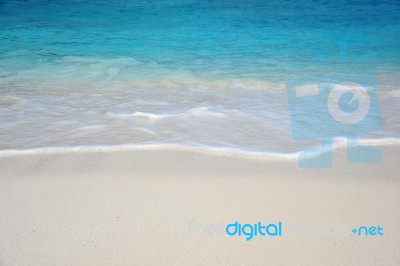 Sea Wave On Beach Stock Photo