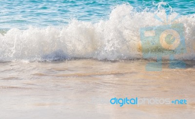 Sea Wave Splashing On The Beach Stock Photo