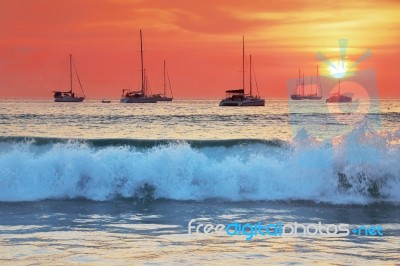 Sea Waves At Sunset Stock Photo