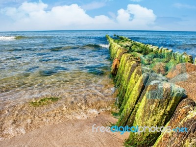 Sea Waves Break On The Breakwater Stock Photo