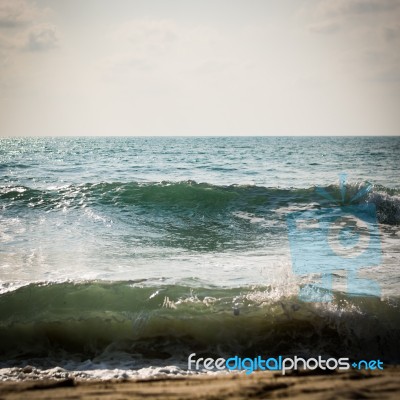 Sea With Surf On The Beach Stock Photo