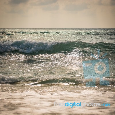 Sea With Surf On The Beach Stock Photo