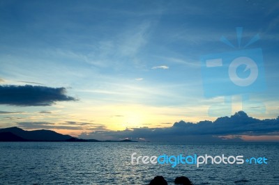 Seascape Sunsset With Fantastic Rock Surface Stock Photo