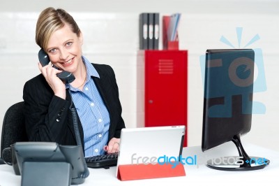 Secretary Attending Phone Call Stock Photo