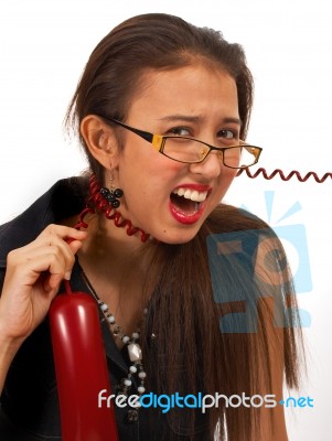 Secretary Frustrated Over Telephone Call Stock Photo