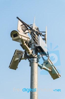 Security Camera Cctv In Blue Sky Stock Photo