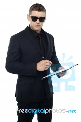 Security Officer holding Clipboard Stock Photo