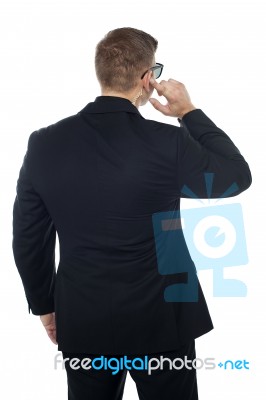 Security officer wearing ear buds Stock Photo