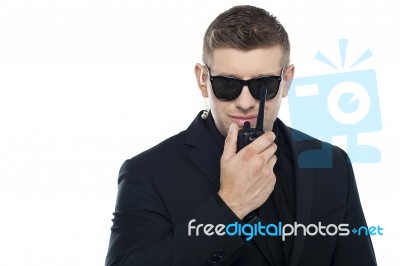 Security Officer with walkie talkie Stock Photo