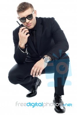 Security Officer With Walkie Talkie Stock Photo