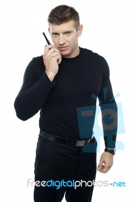 Security Officer with walkie talkie Stock Photo