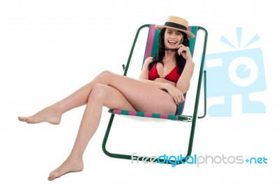 Seductive Bikini Woman Relaxing On A Deckchair Stock Photo