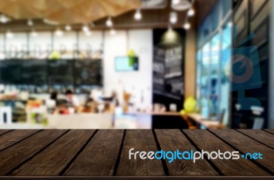 Selected Focus Empty Brown Wooden Table And Coffee Shop Or Resta… Stock Photo