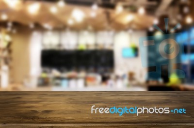 Selected Focus Empty Brown Wooden Table And Coffee Shop Or Resta… Stock Photo