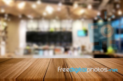 Selected Focus Empty Brown Wooden Table And Coffee Shop Or Resta… Stock Photo