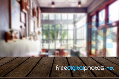 Selected Focus Empty Brown Wooden Table And Coffee Shop Or Resta… Stock Photo