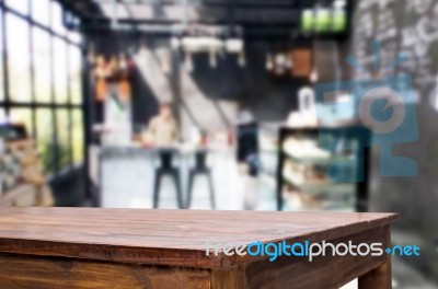 Selected Focus Empty Brown Wooden Table And Coffee Shop Or Resta… Stock Photo