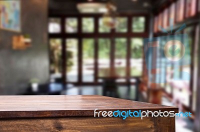 Selected Focus Empty Brown Wooden Table And Coffee Shop Or Resta… Stock Photo