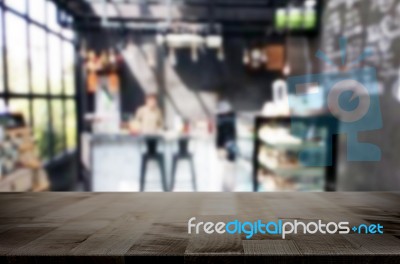 Selected Focus Empty Brown Wooden Table And Coffee Shop Or Resta… Stock Photo