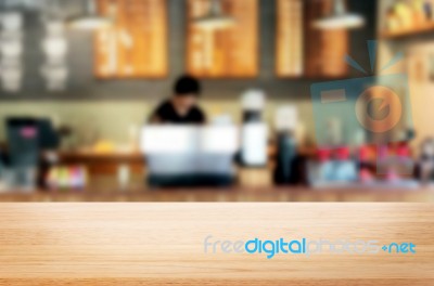 Selected Focus Empty Brown Wooden Table And Coffee Shop Or Resta… Stock Photo