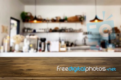 Selected Focus Empty Brown Wooden Table And Coffee Shop Or Resta… Stock Photo