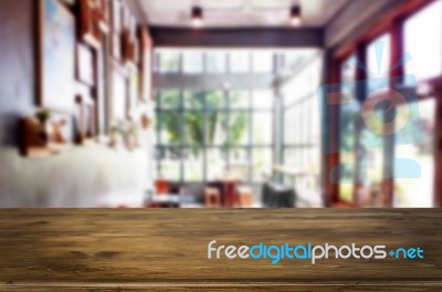 Selected Focus Empty Brown Wooden Table And Coffee Shop Or Resta… Stock Photo