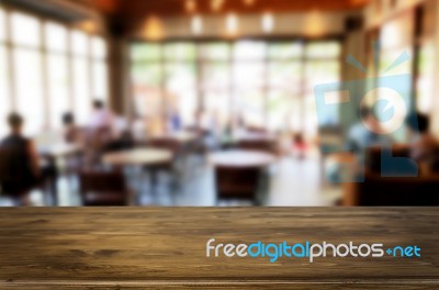 Selected Focus Empty Brown Wooden Table And Coffee Shop Or Resta… Stock Photo