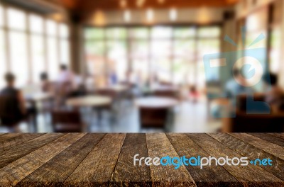 Selected Focus Empty Brown Wooden Table And Coffee Shop Or Resta… Stock Photo